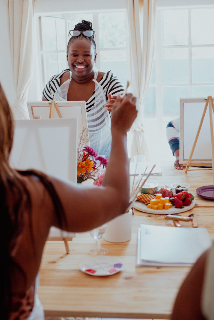 Pair painting together